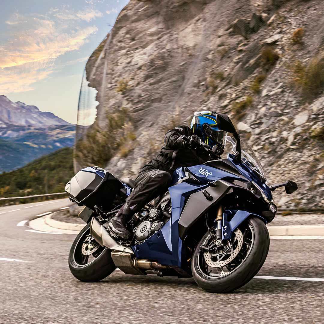 The all-new Suzuki GSX-S1000GT riding through mountains