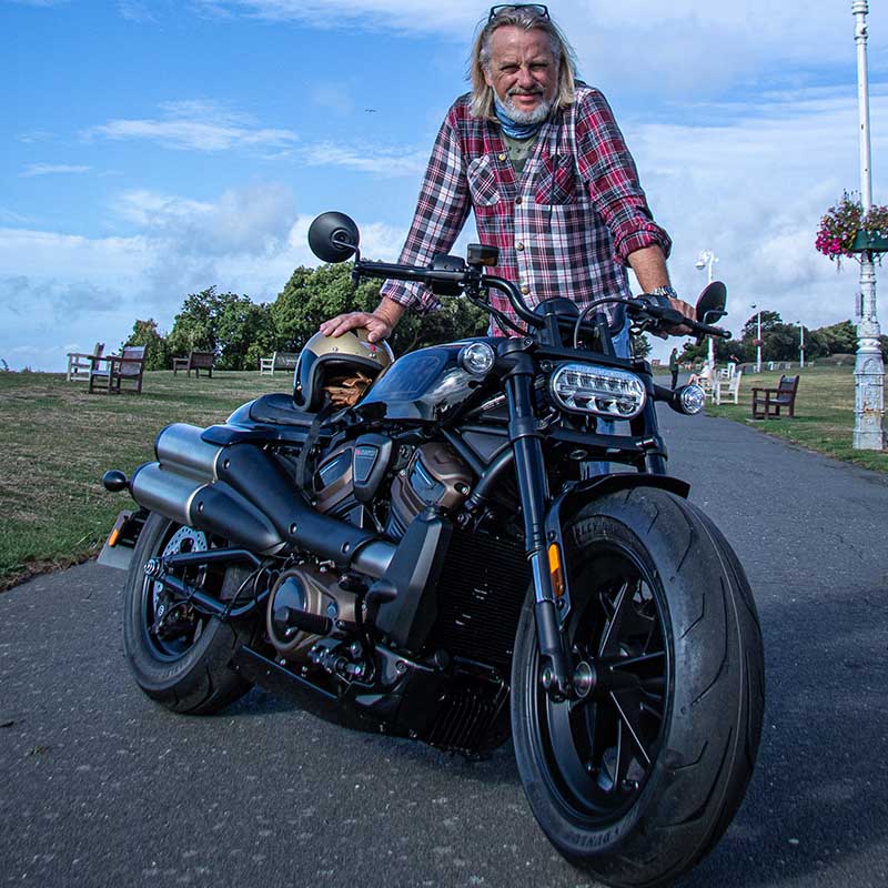 Henry Cole standing beside the Sportster® S