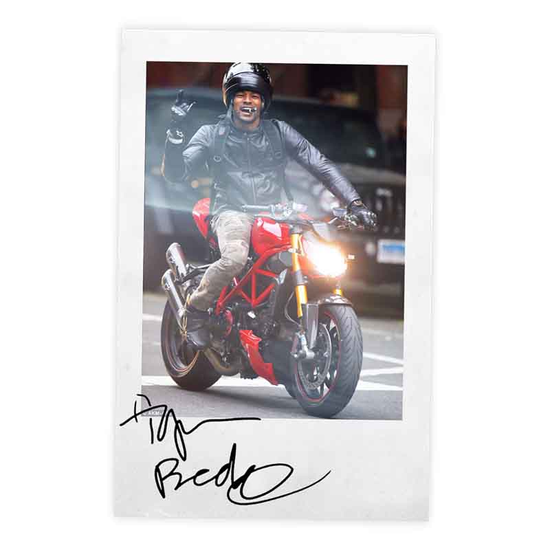Signed polaroid of Tyson Beckford with his Ducati Streetfighter
