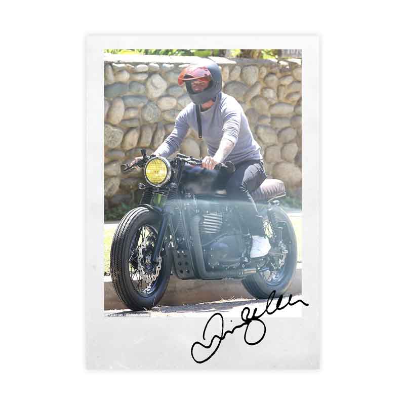 Signed polaroid of David Beckahm with his Bonneville Custom