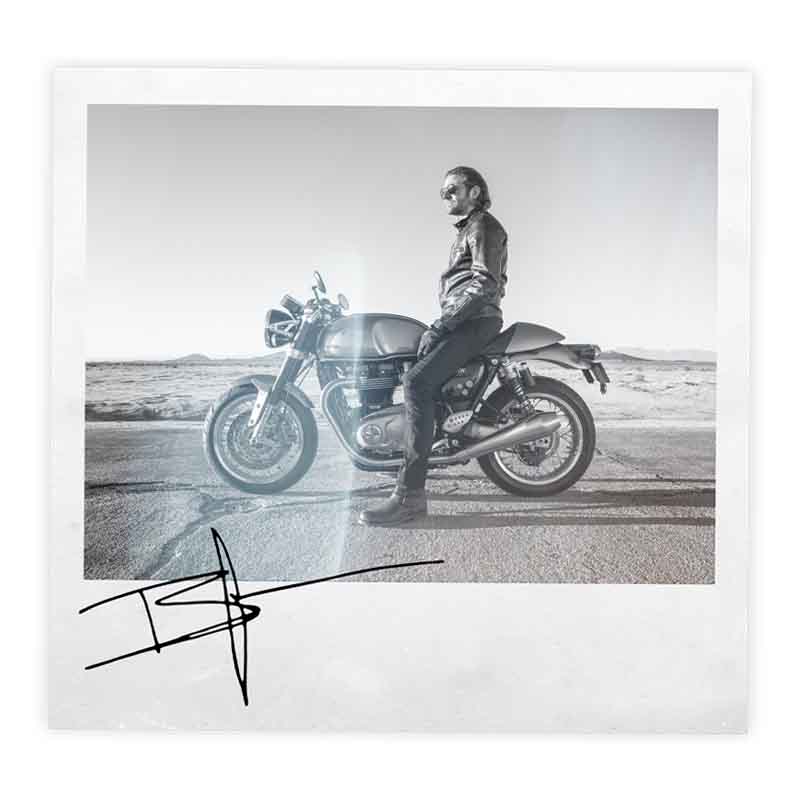 Signed polaroid of Bradley Cooper and his Thruxton R