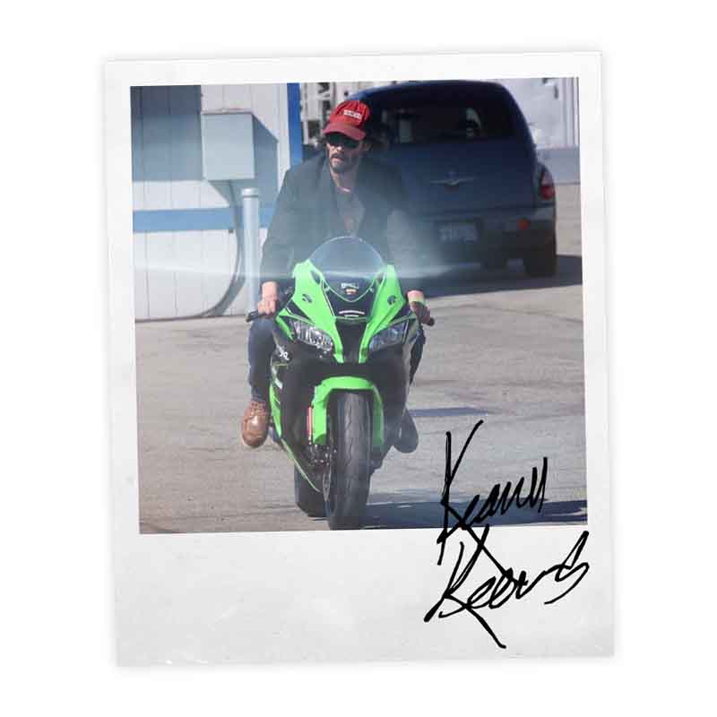 Signed polaroid of Keanu Reeves and his ZX-10R