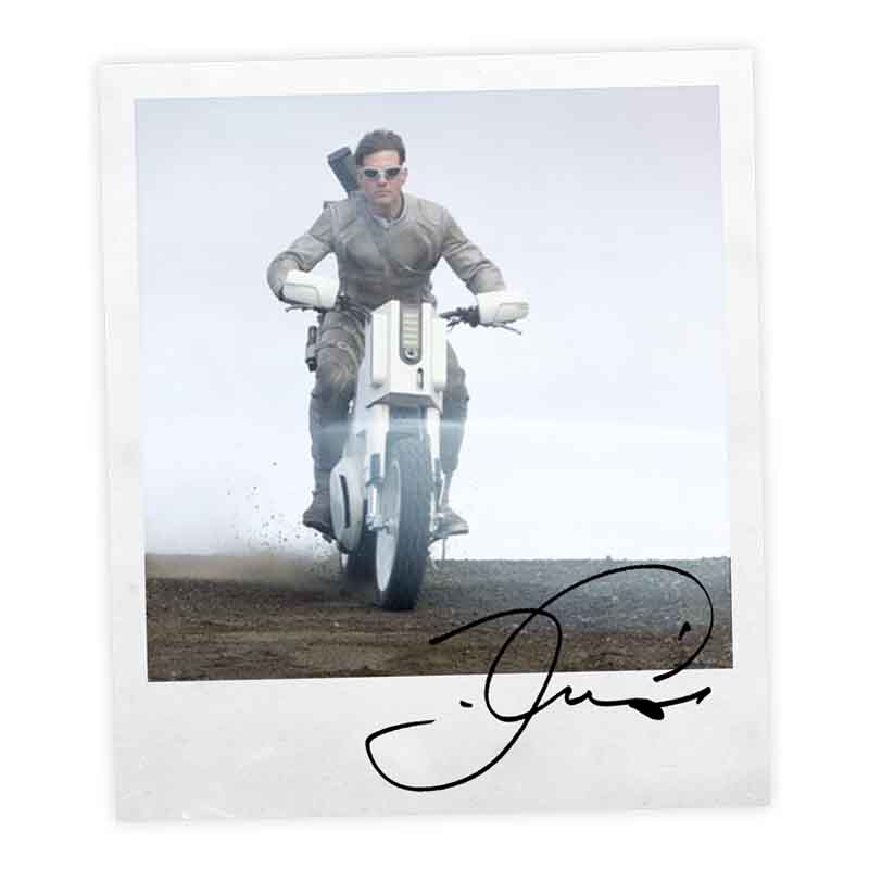 Signed polaroid of Tom Cruise and his CRF450X