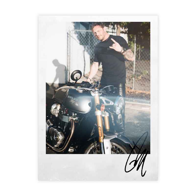 Signed polaroid of Tom Hardy and his Triumph Thruxton