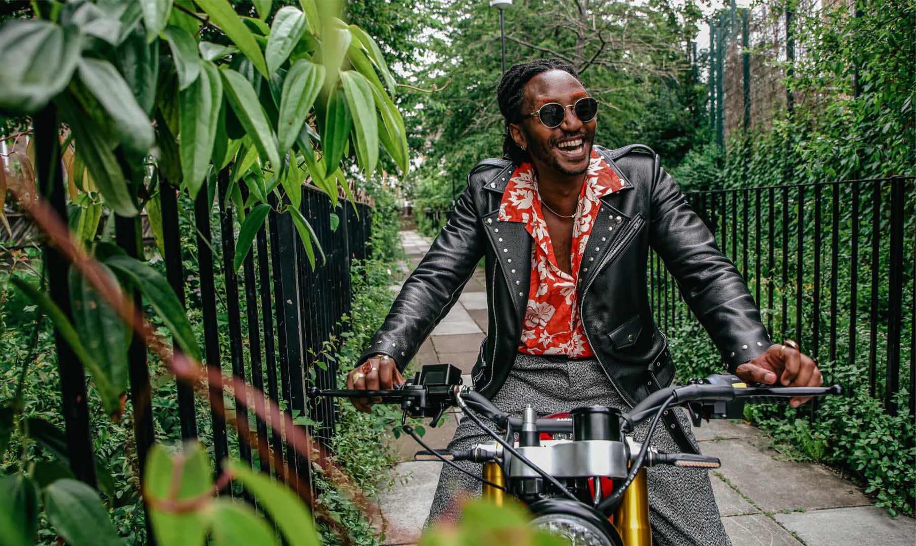 Seye Adelekan from the Gorillaz aboard the Razorback Gloss Red