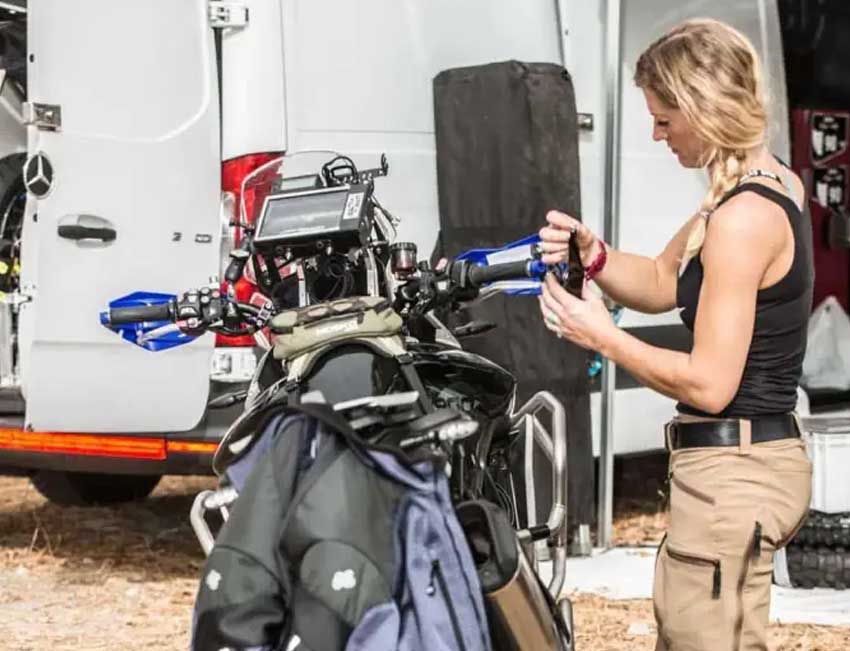 Ruck installing hand guards on the Tiger 900 Rally Pro